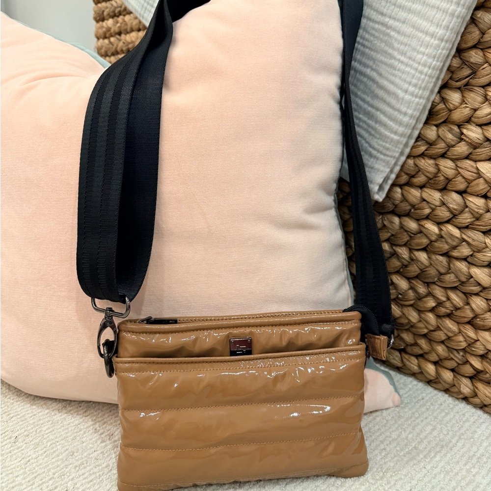 THINK ROYLN Glossy Tan Quilted Crossbody with Black Strap